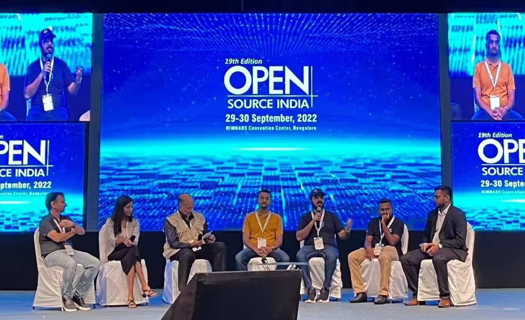 Joshua Poddoku on a panel at Open Source India 2022